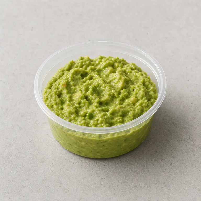 Guacamole (aberto) em uma superfície neutra